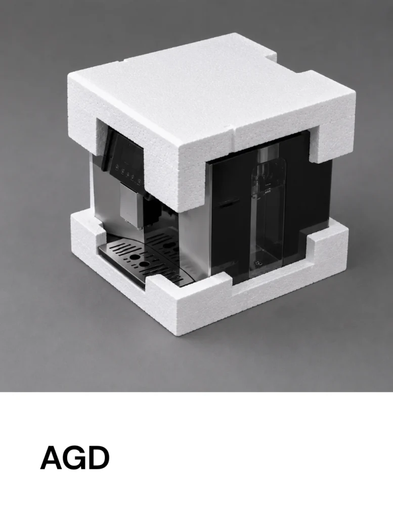 Espresso machine partially wrapped in white foam packaging for shipping.