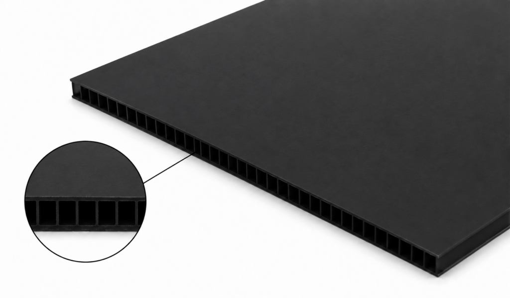 Black flat panel with a hollow rectangular honeycomb core visible along the edge (cross-section).